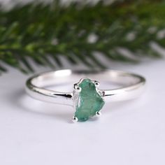 "Rough Raw Emerald Ring, 925 Sterling Silver, Uncut Raw Gemstone Ring, Solitaire Stone Ring, Stacking Ring, Engagement Ring, Gift for Her Item Made With Pure 925 Sterling Silver and Nickel, Cadmium Free. YOU WILL RECEIVE A ROUGH EMERALD STONE RING IN THE SAME STYLE SETTING, BUT ROUGH EMERALD STONE SHAPE WILL VARY IN EACH RING. EACHROUGH STONE IS UNIQUE AND WE TRY OUR BEST TO PUT THEM IN A RING IN THERE NATURAL FORM SO PLEASE EXPECT SLIGHT VARIATION IN TEXTURE, COLOR, SHAPE AND SIZE. We accept cu Raw Emerald Ring, Emerald Stone Rings, Smaragd Ring, Raw Emerald, Raw Gemstone Ring, Natural Form, Texture Color, Ring Stacking, Emerald Stone