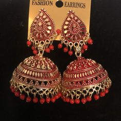 Beautiful Gold And Red Color Jhumka Earring Red Jhumkas Earrings, Jumka Earrings Gold Indian Jewelry, Red Earrings Indian, Red Jhumka, Jumka Earrings, Desi Vibes, Jhumka Designs, Moodboard Ideas, Crystal Teardrop Earrings