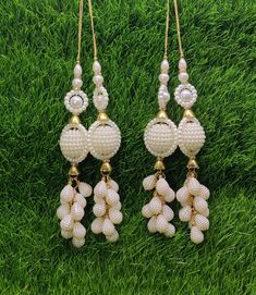 16 cm 2 pc White Beaded Blouse Lahenga Latkan Tassels, home décor, lamp shades tassels, Hanging for Handbags, Indian Saree, Dupatta Size - 16.0 cm Length  **Item Description** *You can use this Beautiful Stylish Indian handmade Tassels for several DIY projects. *These beautiful Tassel Latkans are used as the accessory for saree blouse on the back, but u can use according to your need and your innovative ideas. * Package contains - Pair of 2 latkans. You may find colors slightly varied from the a Luxury White Chandbalis With Latkans, Affordable Celebration Danglers With Latkans, Traditional White Bridal Accessories For Party, Elegant White Tikka With Gota Work, White Tikka For Eid Celebrations, Traditional Lehenga With Latkans For Reception, Traditional Bridal Accessories For Festivals And Celebrations, Traditional White Bridal Accessories For Celebration, Festive White Tikka With Gota Work