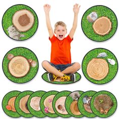 a young boy sitting on top of a green mat with lots of different items around him