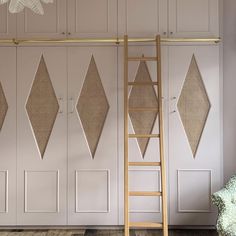 a ladder leaning against a wall next to a white door with diamond cutouts on it