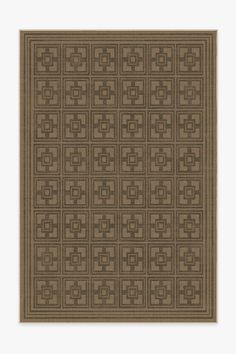 a brown rug with squares and crosses on it