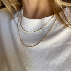 A great addition to our necklace collection. The thin Figaro Chain. Only 1.5mm and a delicate style to make you flourish. Metal: 18k gold-filled 1/20 Wide: 1.5mm 3x1 link pattern Figaro Chain Available in: 16 inches, 18 inches + 2 inches extender 20 inches Hypoallergenic + Waterproof Made in Brazil Sophisticated Jewelry, Figaro Chain Necklace, Necklace Collection, Ring Bag, Figaro Chains, Figaro Chain, Anklet Bracelet, Pendant Rings, Anklet Jewelry