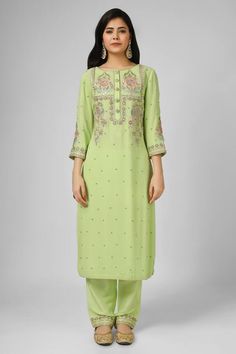 Lime green silk georgette kurta with floral hand embroidery. Comes with viscose dupion sharara and an organza dupatta. - Aza Fashions Green Resham Embroidered Georgette Kurta, Green Georgette Kurta With Dabka Work, Green Zari Work Kurta In Georgette, Unstitched Green Georgette Sets, Green Georgette Set With Zari Work, Green Sets With Zari Work In Georgette, Green Palazzo Set With Straight Kurta And Resham Embroidery, Pista Green Palazzo Set With Dabka Work In Georgette, Elegant Semi-stitched Green Palazzo Set