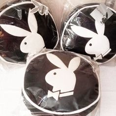 three black and white bags with bunny ears on them