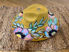 hand painted Spring Artistic Fedora Hat, Artistic Fedora Hat For Spring, Artisan Fedora For Spring Country Events, Custom Beach Fedora For Spring, Custom Fedora For Beach In Spring, Artsy Spring Fedora Hat, Artistic Fedora With Short Brim For Spring, Custom Hand Painted Brimmed Fedora, Custom Hand Painted Adjustable Fedora