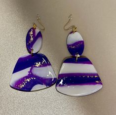 Purple,white and gold polymer clay earrings Hand Painted White Resin Earrings, Hand Painted White Drop Earrings, Handmade White Resin Earrings, Unique Purple Polymer Clay Earrings, White Hand Painted Drop Earrings, Unique White Polymer Clay Earrings, Hand Painted White Earrings As A Gift, White Hand Painted Earrings For Gift, Hand Painted White Earrings For Gift