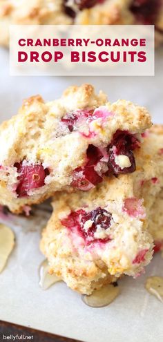 cranberry - orange drop biscuits are stacked on top of each other