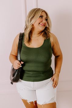 Our adorable plus size hunter green colored 'Basic Instincts' tank is the upgrade your wardrobe basics have been begging for! It features soft and stretchy lightweight seamless material, a scooped neckline, 1-inch shoulder straps, and a form fitting silhouette that falls into a straight hemline! Measurements 1XL-2XL : Bust 30", Hip 30", Length 27", Waist 30". 2XL-3XL : Bust 32", Hip 32", Length 28", Waist 32". Versatile Green Seamless Tank Top, Versatile Seamless Green Tank Top, Basic Instinct, Scooped Neckline, Wardrobe Basics, Model Fits, Women Clothing Boutique, Hunter Green, Hip Length