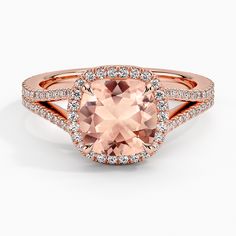 Morganite Fortuna Engagement Ring - 14K Rose Gold. This exceptional setting features a halo of diamond accents that curve gently around a stunning cushion-shaped morganite for a distinctive look. Two rows of pav diamonds sparkle on the contemporary split shank band, while a surprise row of diamond accents on the bridge completes this glamorous look (0.55 total carat weight). Rose Gold Morganite, Brilliant Earth, Split Shank, The Bridge, Morganite, Pave Diamonds, Rose Gold Ring, Halo, Gold Rings