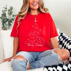 Get in the holiday spirit with this festive adult Christmas shirt! Featuring a beautiful and magical star Christmas tree design, this shirt is perfect for spreading cheer wherever you go. Made with high-quality materials, this shirt is both comfortable and durable, making it ideal for all your holiday festivities. The eye-catching design and classic Christmas colors make this shirt a must-have for any fan of the holiday season. The fabric is soft on the skin, ensuring all-day comfort for any occ New Year Holiday Crew Neck T-shirt, Festive Winter T-shirt With Short Sleeves, Crew Neck T-shirt For New Year's Holiday, Festive Short Sleeve T-shirt For Winter, Crew Neck T-shirt For New Year Holiday, Festive Christmas Crew Neck T-shirt, Christmas Holiday T-shirt With Short Sleeves, Christmas Holiday Short Sleeve T-shirt, Festive Crew Neck T-shirt For New Year