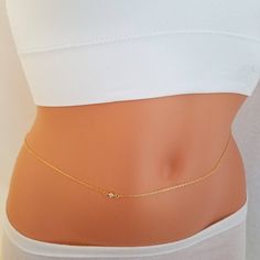 Hey, I found this really awesome Etsy listing at https://www.etsy.com/listing/184171065/cz-diamond-belly-chain-gold-belly-chain Belly Jewellery, Belly Chain Body Jewelry, Chain Body Jewelry, Chains Aesthetic, Wax Cord Bracelet, Flirty Outfits, Waist Jewelry, Belly Jewelry, Ring With Diamond