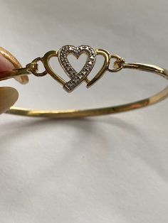 Excellent Condition Vintage Heart Bracelet For Valentine's Day Anniversary, Heart-shaped Hallmarked Bracelets As A Gift, Classic Heart-shaped Anniversary Bracelets, Heart Bangle Bracelet For Valentine's Day Formal, Heart Bangle Bracelet For Valentine's Day, Heart Bangle Bracelet For Valentine's Day And Formal Occasions, Valentine's Day Heart Bangle Bracelet For Formal Occasions, Valentine's Day Formal Heart Bangle Bracelet, Classic Heart-shaped Gold Bracelet For Anniversary