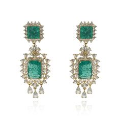 Elevate your elegance with our beautiful Emerald Crystal Earrings, delicately set in rhodium-plated brass. The enchanting shade of green exudes a serene and calming aura, making these earrings a timeless addition to your jewelry collection. Crafted with meticulous attention to detail, these earrings boast a captivating design that effortlessly captures the essence of sophistication. The shimmering aquamarine crystals sparkle with every movement, adding a touch of glamour to any ensemble. Avoid c Luxury Green Gemstone Earrings, Green Hand-set Diamond Earrings, Luxury Green Diamond Earrings Gift, Luxury Green Diamond Earrings For Gift, Green Hand Set Diamond Earrings, Luxury Green Diamond Earrings For Wedding, Green Sterling Silver Luxury Diamond Earrings, Luxury Green Sterling Silver Diamond Earrings, Green Fusion Style Drop Earrings