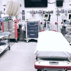 a hospital room filled with lots of medical equipment