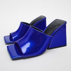 Nwt Metallic Blue Geometric Block Heel Square Toe Mule Sandal, 8 Brand New Zara Block Heel Slides In Blue, 8 Block Heel (~3.7in/9.3cm Heel Height) Slides W/ Square Toe & Shiny Metallic Effect Increased Comfort W/ Airfit Flexible Technical Sole 100% Polyurethane W/ 100% Polyester Lining, 100% Polyurethane Thermoplastic Sole & Mixture Of Sheep Leather (70%) & Polyurethane (30%) Insole Thanks For Looking!!! Chic Blue Square Toe Mules, Blue Square Toe Mules For Summer, Blue Mules For Summer Evenings, Blue Block Heel Sandals For Party, Blue High Heel Mules For Evening, Blue Pointed Toe Mules For Evening, Trendy Blue High Heel Mules, Trendy Blue Open Toe Mules, Blue Party Sandals With Block Heel