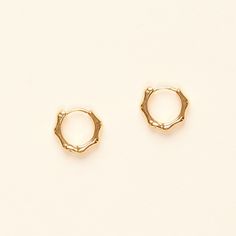 "A new take on classic gold hoops, these geometric hoop earrings are perfect to wear alone or stacked with other earrings for a modern look. They are adorable and dainty. - Materials: 18K gold plated brass and silver posts - Measurements: approximately 0.4\" / 1cm in diameter - The product is tarnish-resistant. The posts are hypoallergenic Q&A 1. What is the material? - It is made from 18K real gold brass 2. Does the color tarnish? - This material is water-resistant. It won't turn your skin gree Geometric Hoop Earrings, Mini Hoop Earrings, Hoops Earrings, Earrings Women, Classic Gold, Gold Brass, Gold Hoops, Jewelry Earrings Hoops, Gold Gold