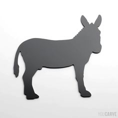 a metal donkey cut out on a white background