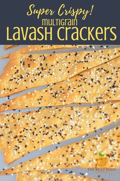 crackers with sesame seeds on them and text overlay that reads super crispy multigrain lavash crackers