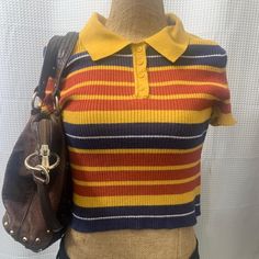 This Forever 21 Top Features A Unique Striped Pattern, Collared Neckline. Size L. Has A Good Amount Of Stretch (Purse Is Only Seen To Show How It Can Be Styled, This Listing Is For The Top Only!!) This Would Pair Nicely With Black Shorts And White Tights!! Does Have Some Wear To It But Overall In Good Condition! Can Totally Work Out In Any Occasion Whether It's A Party, Casual Outing, Or Workwear. (This Piece Is Not Brand New So Expect Obvious Signs Of Flaws/Wear) I Try To State Any That I See. Trendy Yellow Color Block Tops, Retro Yellow Color Block Tops, Fitted Yellow Crop Top For Fall, Yellow Retro Color Block Tops, Yellow Y2k Crop Top For Spring, Trendy Yellow Crop Top, Forever 21 Yellow Cotton Top, 90s Inspired Yellow Cotton Top, Yellow Cotton Top, 90s Inspired