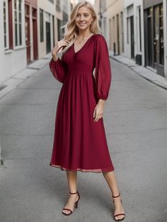 Step into any cocktail party or special event with confidence in this stunning Chiffon V-Neck Long Sleeves Elastic Band Midi Dress. The combination of the flowing chiffon fabric, v-neckline, and long sleeves exudes a classy and refined vibe. Complete your look with heels and accessories for a memorable appearance that will turn heads all night long. Fit: Please refer to size chart. Length: Midi length. Sleeve Style: Long sleeves. Closure: It is concealed a zipper up the back. Undergarments: It i Solid V-neck Chiffon Dress, Elegant Chiffon V-neck Dress For Wedding Guest, Elegant V-neck Chiffon Dress For Wedding Guest, Elegant Flowy Chiffon V-neck Dress, Flowy Chiffon V-neck Dress For Wedding Guests, Formal Flowy V-neck Chiffon Dress, Flowy V-neck Chiffon Dress For Formal Occasions, V-neck Chiffon Bridesmaid Dress, Elegant V-neck Chiffon Cocktail Dress