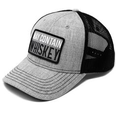 a gray and black hat with the words may contain whiskey on it's front