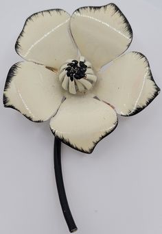 Western antique 3- Dimensional white enamel flower jewelry pin. This is made of alloy, enamel and measures 2 3/4 inches x 2 inches. In very good well-kept condition. We don't not see any cracking. Thank you for shopping with our small business Vintage White Enamel Pin, White Vintage Enamel Pin, Vintage White Flower Enamel Pin, White Enamel Flower Brooches, White Flower-shaped Enamel Brooches, Vintage White Flower Brooches, White Flower Enamel Brooches, White Vintage Flower Brooches, White Flower-shaped Enamel Pin