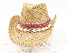 Tucson Pink and Gold Aztec Band & Seashells on Natural Tan Cowboy Hat - Shapeable 100% Cotton Straw Outdoor Breathable Sturdy Box It's always ready to keep you shaded.  Material: Durable natural woven straw Hat Size: US Hat Size 7 1/4 - 7 1/2 Hat Crown: 12cm Hat Brim: 8cm Color: Straw Tan Size fits up to 23.5 inches 58cm-60cm Free Hat Retainer with each Hat Order Western Style Sun Hat For Beach, Western Style Sun Hat For The Beach, Western Style Beach Sun Hat, Western Style Sun Hat For Vacation, Western Style Sun Hat Cap For Vacation, Western Style Cap Sun Hat For Vacation, Adjustable Pink Hat Band For Beach, Adjustable Pink Hat Bands For Beach, Adjustable Pink Hat Band For The Beach