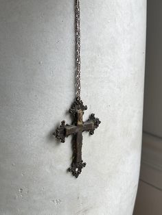 Exquisite large rosary cross pendant aged to perfection with the most beautiful patina. Metal is light, and discolored from age and air. Chain included, very long and perfect for layering, all brass and silver tone metal with patina.  Good antique condition, distressing and imperfections are visible on purpose.  All sales final. Bronze Cross Bohemian Necklace, Bronze Bohemian Cross Necklace, Bohemian Bronze Cross Necklace, Bronze Crucifix Necklace For Spiritual Purposes, Spiritual Bronze Crucifix Necklace, Antique Brass Cross Pendant Necklace, Antique Bronze Crucifix Jewelry, Vintage Brass Cross Jewelry, Vintage Brass Cross Pendant Necklace