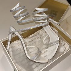 Brand New Rene Caovilla Wrap Sandals Us Size 7. Perfect For Brides Or Black Tie Events/Weddings!! Paid 1,800 With Tax! Poshmark Will Authenticate! No Low Balls You Will Be Blocked! Elegant Fitted White Sandals, Luxury Wedding Sandals, White Sandals With Heel Strap For Gala, Glamorous White Sandals With Heel Strap, Designer White Sandals For Formal Occasions, Luxury Pointed Toe Wedding Sandals, Elegant White Sandals With Rhinestones, Designer White Formal Sandals, Luxury Wedding Sandals With Pointed Toe