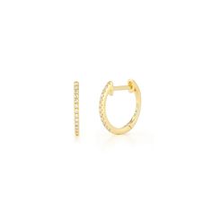 The Diamond Huggie Earrings are the big sister to our Diamond Mini Huggie Earring. With an 8mm inner diameter, this dainty style offers a bit more room on the lobe. And with a single row of pavé diamonds, these earrings bring just the right amount of sparkle. Classic Gold Huggie Earrings With Brilliant Cut, Classic Gold Huggie Diamond Earrings, Classic Single Huggie Diamond Earring, Yellow Gold Huggie Earrings With Brilliant Cut, Timeless Gold Round Cut Huggie Earrings, Classic Huggie Diamond Earrings, Minimalist Huggie Diamond Earrings For Formal Occasions, Classic Everyday Round Cut Huggie Earrings, Classic Everyday Diamond Earrings With Matching Set