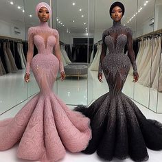 two mannequins dressed in pink and black gowns