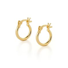 Our Small classic gold hoop earrings are perfect for everyday wear when simplicity is key. Available in three sizes—small, medium, and large—you can choose the one that best complements your style. Featuring a hinged post and click closure, these hoops are comfortable, secure, and easy to wear. Whether you prefer large silver hoops or small gold hoops, there's a size and finish to suit every look. We want your jewellery to stay in great condition so you can enjoy it for years to come. With some Large Silver Hoop Earrings, Jewelry Magazine, Small Gold Hoops, September Birthstone Jewelry, Jewelry Ring Box, Earrings Small, Pearl Jewellery Earrings, Men's Jewelry Rings, Large Hoop Earrings