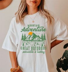 Adventure Shirt, Travel Shirt, Hiking Shirt, Desert Shirt, Explore Shirt, Mountain Shirt, Camping Shirt Tee, Nature Lover Gifts, Road Trip shirt We are delighted to see you here! Visit our main page to explore more design options! We are sure you will love our designs! Please feel free to message me if you have any questions or requests. I'll get back to you as soon as possible. 👉For oversized fit go one sizes up your normal size 👉Our Unisex T-Shirt brand is Comfort Colors® 1717 👉HOW TO ORDER T-SHIRT. 1- Please check all of the listing images. 2- Select your Shirt size from selection box. 3- Select your Shirt color from the selection box. 4- Select the quantity. 5- Go to add to cart. 🕕Production Time 1-2 business days🕕 -Standart Shipping 2-5 business days after production time. -Print Mountain Shirt, Travel Shirt, Hiking Shirt, Adventure Shirt, Hiking Shirts, Travel Shirts, Gifts For Nature Lovers, Camping Shirt, Shirt Brand