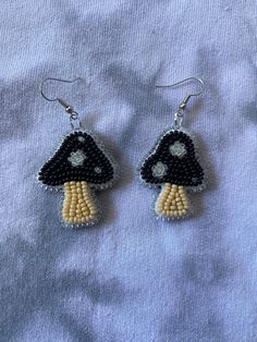 These beaded earrings are handmade and lightweight, making them comfortable to wear! Handmade Casual Beaded Earrings, Casual Handmade Beaded Earrings, Handmade Casual Dangle Earrings, Casual Handmade Beaded Dangle Earrings, Adjustable Dangle Beaded Earrings With Bead Caps, Handmade Black Casual Earrings, Casual Beaded Earrings Gift, Handmade Casual Black Earrings, Casual Colorful Beaded Earrings