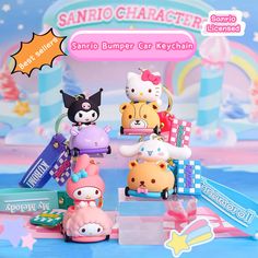 some hello kitty figurines sitting on top of each other in front of a sign that says sanrio character