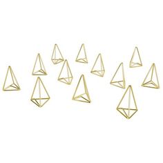 six gold pyramids are arranged in a row on a white background, with one facing the camera