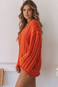 Orange Ribbed Loose Knit V Neck Pullover Sweater Solid Color Knit Sweater Dress For Fall, Oversized Ribbed Sweater Dress, Oversized Ribbed Sweater Dress Casual, Casual Oversized Ribbed Sweater Dress, Oversized Ribbed Crew Neck Cardigan, Knit Crew Neck Cardigan In Solid Color, Solid Color Knit Top For Fall, V Neck Pullover, Knit V Neck