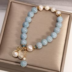 Aquamarine Jade Freshwater Cultured Pearl Bracelet in 14K Gold Over St – Huge Tomato Elegant Pearl Jewelry, قلادات متدلية, Cultured Pearl Bracelet, Freshwater Pearl Jewelry, Beads Bracelet Design, Freshwater Pearl Bracelet, Agate Bracelet, Money Bag, Blue Agate