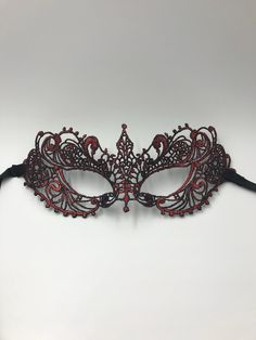 I just love the colors mixed in this beautiful masquerade mask the fire red color and the black make the design of the mask stand out and look so elegant. This is a very elegant but yet very comfortable to wear for the long hours of the masquerade parties. I hope you like this mask if you wish it to be all black or any color you to match the clothes for the night please feel free to contact me that will not interfere with the shipping dates or the price. Please take a look at my shop I have a va Mardi Gras Prom, Black Masquerade, Black Masquerade Mask, Lace Masquerade Masks, Mask For Halloween, Fancy Dress Ball, Masquerade Ball Mask, Masquerade Theme, Halloween Queen