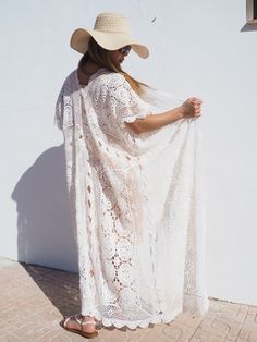 Very cool vintage crochet oversized long waitcoat handmade cotton crochet up-cycled by Vagabond Ibiza We hand source antique and vintage crochet & lace textiles and up-cycle it here in Ibiza in to unique on off a kind garment just for you. Due to the nature there could be some imperfections but we do our best to only recycle mint condition textiles. Size is free size Condition is perfect White Crochet Bohemian Cover-up, White Bohemian Open Knit Cover-up, Bohemian Lace Crochet Top With Open Knit, White Bohemian Long Crochet Dress, White Long Bohemian Crochet Dress, Bohemian Crochet Top With Lace Patchwork For Vacation, White Bohemian Crochet Lace Cover-up, Bohemian Crochet Lace Dress For The Beach, Bohemian Long Cover-up With Lace Trim