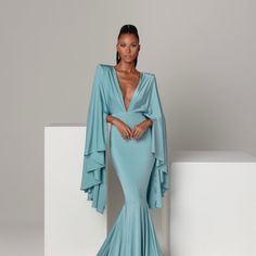 Harlow Elegant Blue Maxi Dress With Cape Sleeves, Chic Gala Gown With Cape Sleeves, Chic Gown With Cape Sleeves For Gala, Long Evening Dress With Draped Sleeves For Gala, Gala Evening Dress With Draped Sleeves, Evening Maxi Dress With Sweep Train And Cape Sleeves, Floor-length Evening Gown With Draped Sleeves, Wedding Gown With Draped Sleeves And V-neck, Elegant Evening Maxi Dress With Kimono Sleeves