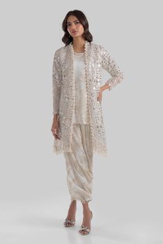 Premium Beige Shade Luxury Pret Front Open Jacket Pakistani Salwar Suit features lavish embroidery done with gilded adda work with accents. Jacket Salwar Suit, Jacket Style Dresses Indian, Over Coat Women, Fancy Dress Patterns, Jacket Style Kurti, Pakistani Salwar Suit, Embellished Embroidery, Indian Outfits Modern, Indian Jackets