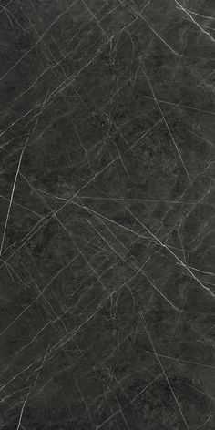 black marble textured with white lines on the top and bottom, as seen from above