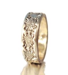 #jewelry #rings #bands #silverjewelry #silverrings #dandelionring #venexiajewelry #engagementband #weddingband #romanticring #onsale #ringforher #floraldesignring #flowerembossedring #silverband #handmadejewelry Dandelion Ring, Dandelion Field, The Dandelion, Romantic Rings, Nature Inspired Rings, Ring Flower, Nature Ring, 925 Silver Ring, Engagement Bands