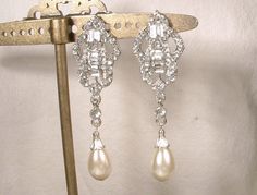 1920s Pearl & Rhinestone Bridal Dangle Earrings, Long Art Deco Crystal Silver Wedding Statement Earrings, Flapper Gatsby Drops Chandelier by AmoreTreasure Vintage Crystal Chandelier Earrings For Wedding, Art Deco Dangle Chandelier Earrings For Wedding, Art Deco Chandelier Earrings, Dangle Style For Wedding, Art Deco Chandelier Earrings For Wedding, Vintage Pearl Drop Chandelier Earrings For Wedding, Vintage Pearl Drop Bridal Earrings, Wedding Statement Earrings, Earrings Long Silver, Bridal Dangle Earrings