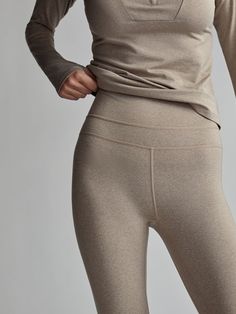 Made in super soft marled jersey with four-way stretch, these insulating leggings provide warmth and flexibility. With a high, rolled waistband for a smoothing effect, they are the perfect choice for any lifestyle. Beige Winter Leggings, Leggings Winter, Warm Leggings, Winter Leggings, Gym Wear, City Life, Base Layer, Half Zip, Gym