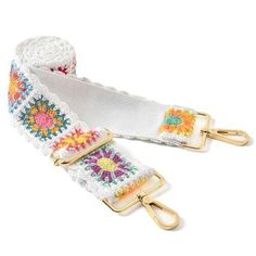 a white belt with colorful flowers on it