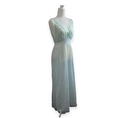 Vintage c1959 Van Raalte Philmy Tricot Peignoir Nightgown #8921 Size: 34 Condition: Very good vintage condition  Fabric: Nylon Color: Pale sea foam green Please let me know if you have any questions.  Thanks!  Kim true vintage intimates gown glamorous 1950s 1960s Summer sleepwear maxi long V-neck Maxi Dress For Wedding Night In Spring, Spring Evening V-neck Sleepwear, Daywear V-neck Lined Maxi Dress, Vintage V-neck Sleep Dress, V-neck Spring Sleepwear, Spring Evening V-neck Nightgown, V-neck Evening Sleepwear For Spring, Vintage V-neck Nightgown For Spring, Flowy Sleeveless Nightgown For Sleep