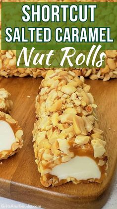 a wooden cutting board topped with sliced almonds and salted caramel nut rolls